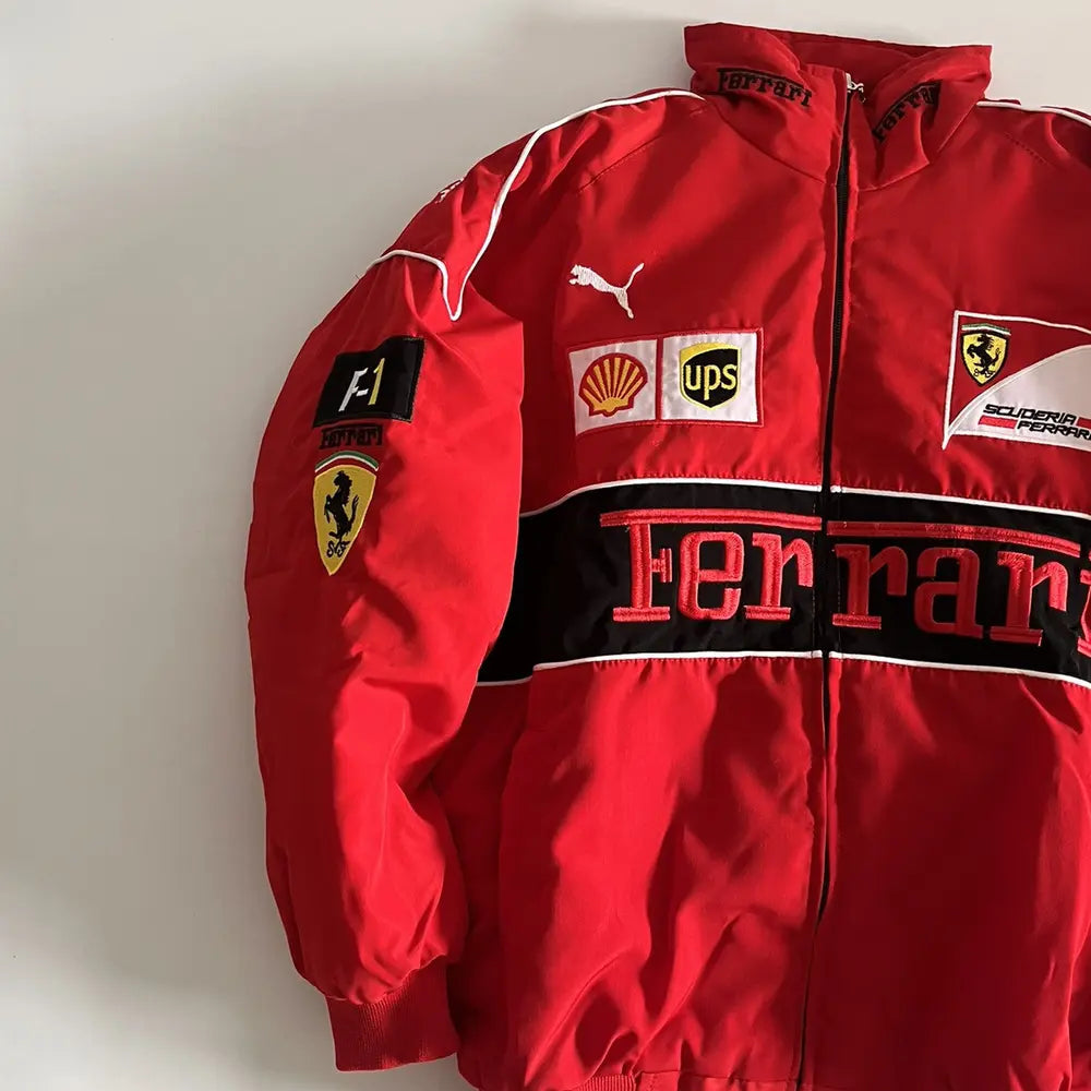Red Ferrari jacket with various logos on a white background