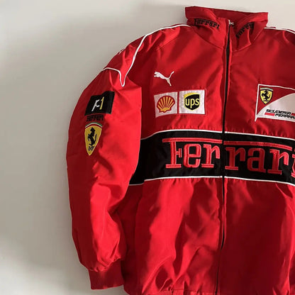Red Ferrari jacket with various logos on a white background
