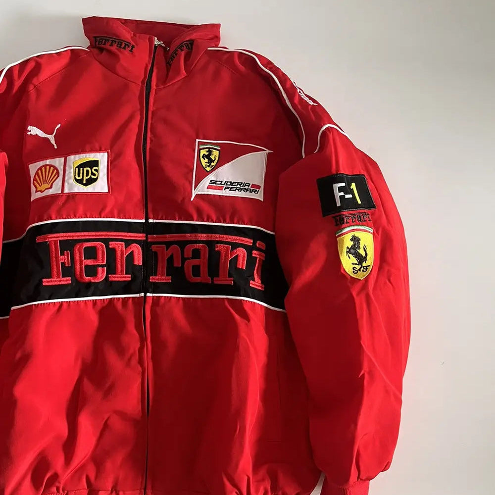 Red Ferrari jacket with various logos on a white background