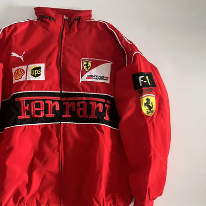 Red Ferrari jacket with various logos on a white background