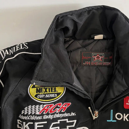 Black racing jacket with various logos on a white background