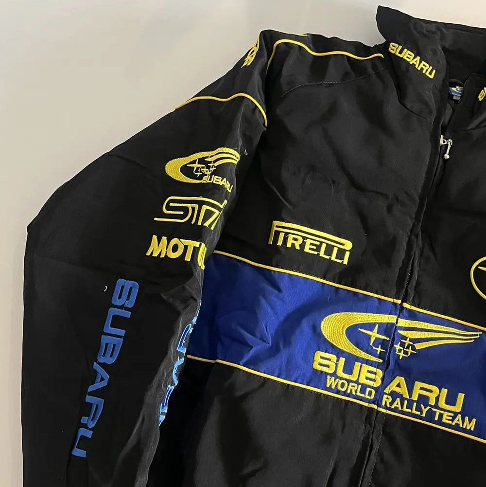 Black jacket with Subaru and other logos on a mannequin against a white background