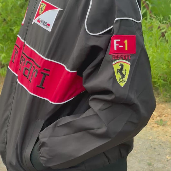 Model wearing Thick Black Ferrari F1 Racing Jacket – Padded Motorsport Streetwear with Embroidered Ferrari Logos, Premium Formula 1 Fan Apparel by Turn One Jackets, showcasing fit, style, and quality
